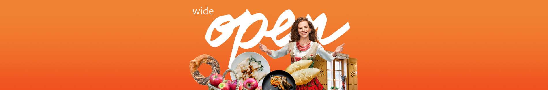 Baner kampanii Małopolska-Cel Podróży. Kolaż zdjęć, między innymi, osoby w stroju ludowym, talerze pełne regionalnych potraw.